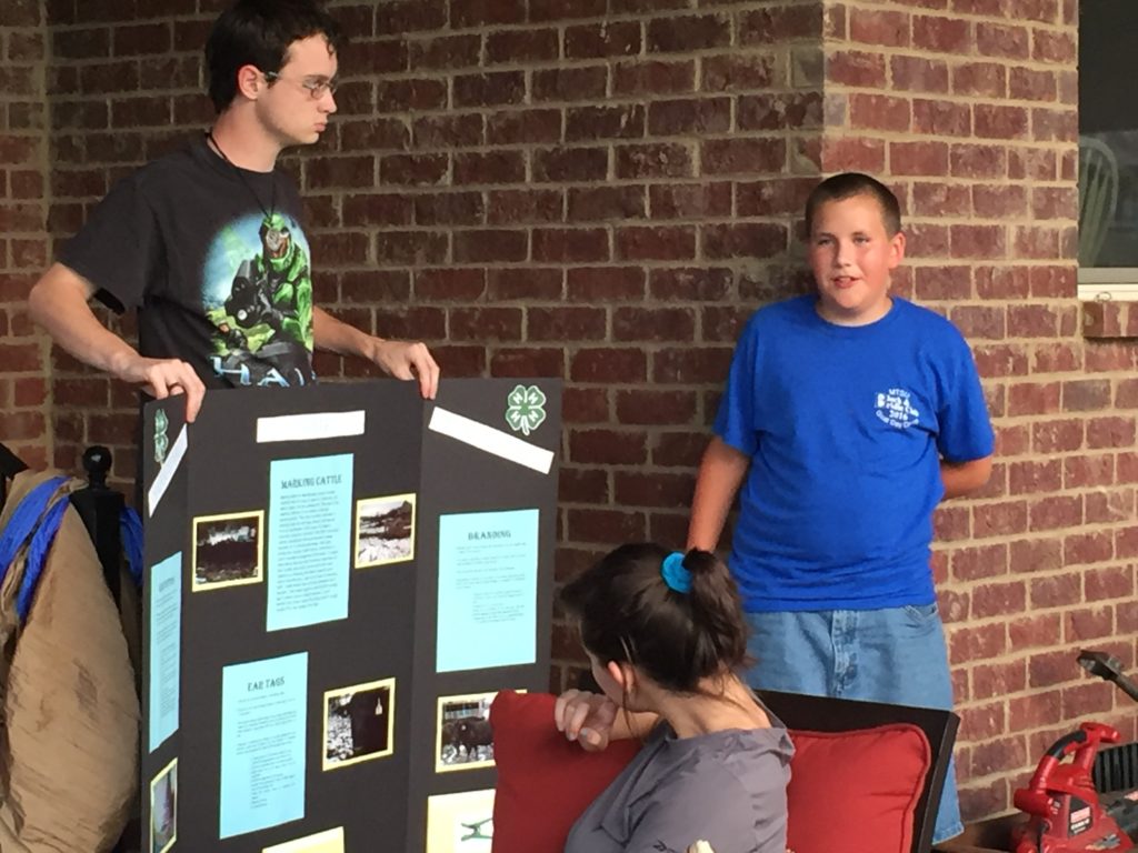 Boy doing a 4-H presentation