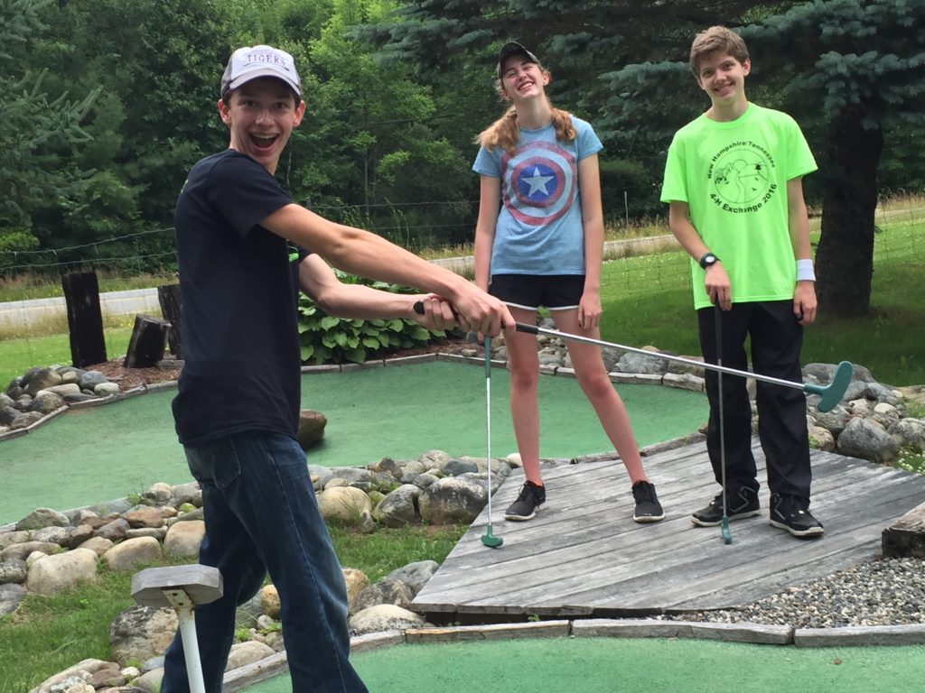 4-H group of kids playing miniture golf