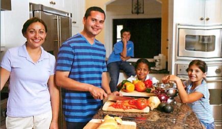Family Cooking In The Kitchen